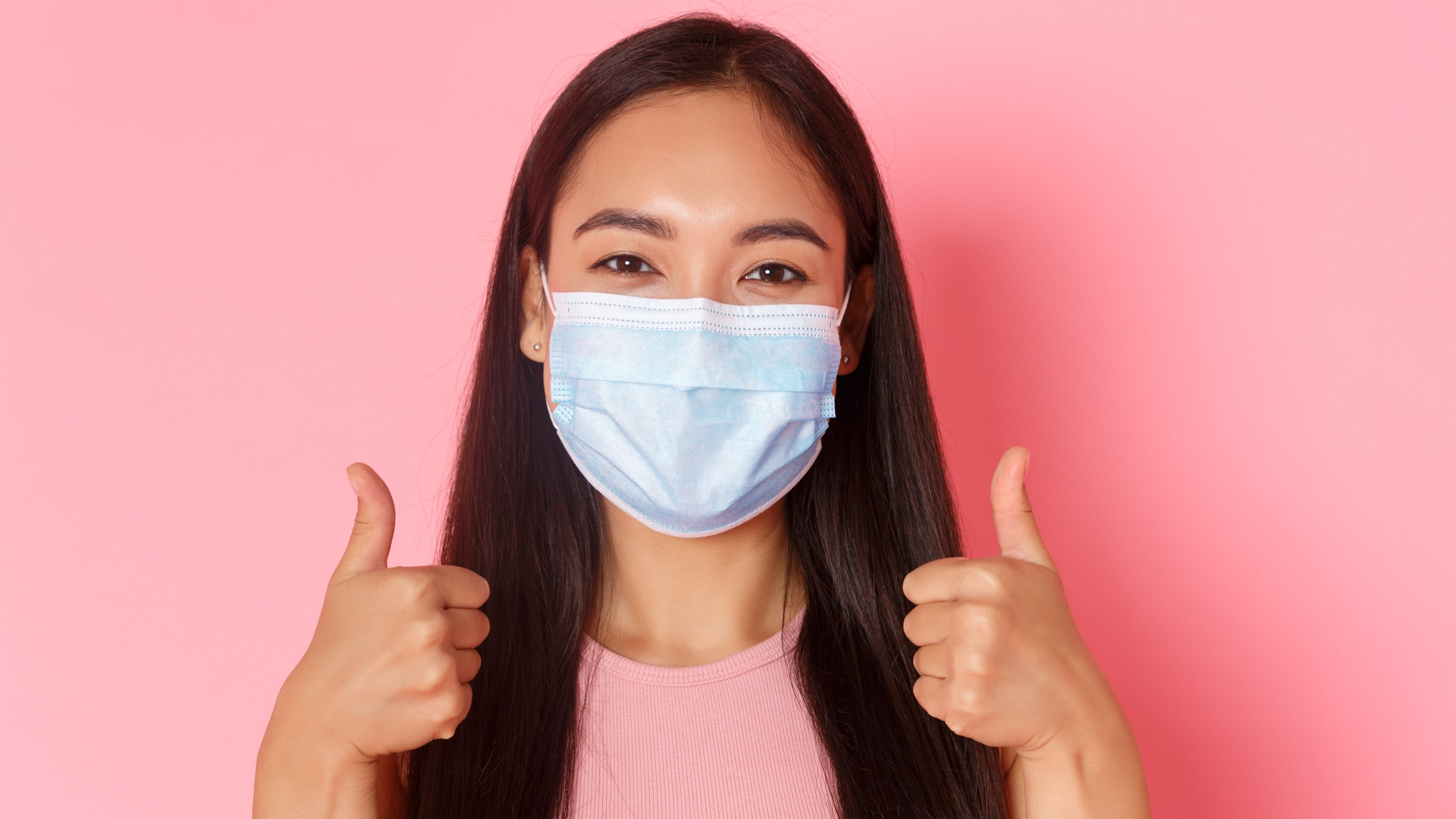 Portrait expressive young woman wearing mask